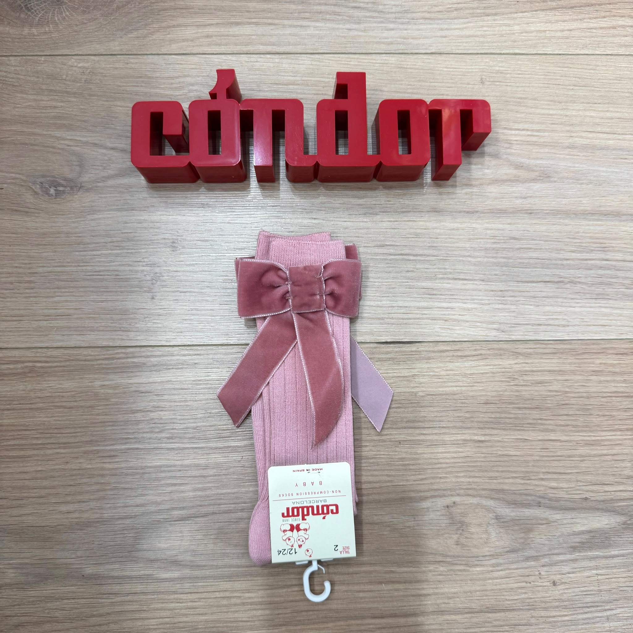 Condor calzino con fiocco in velluto