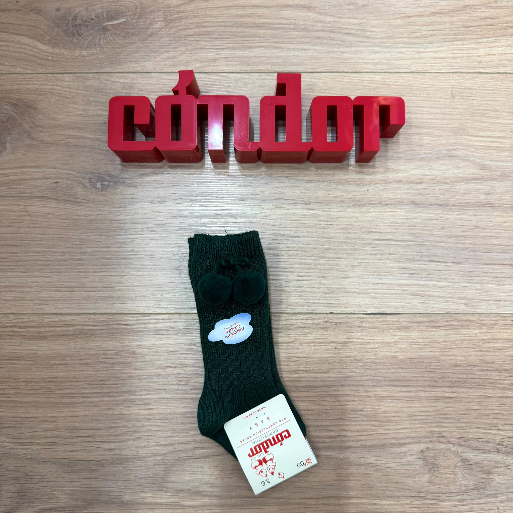 Condor calzino con pompon