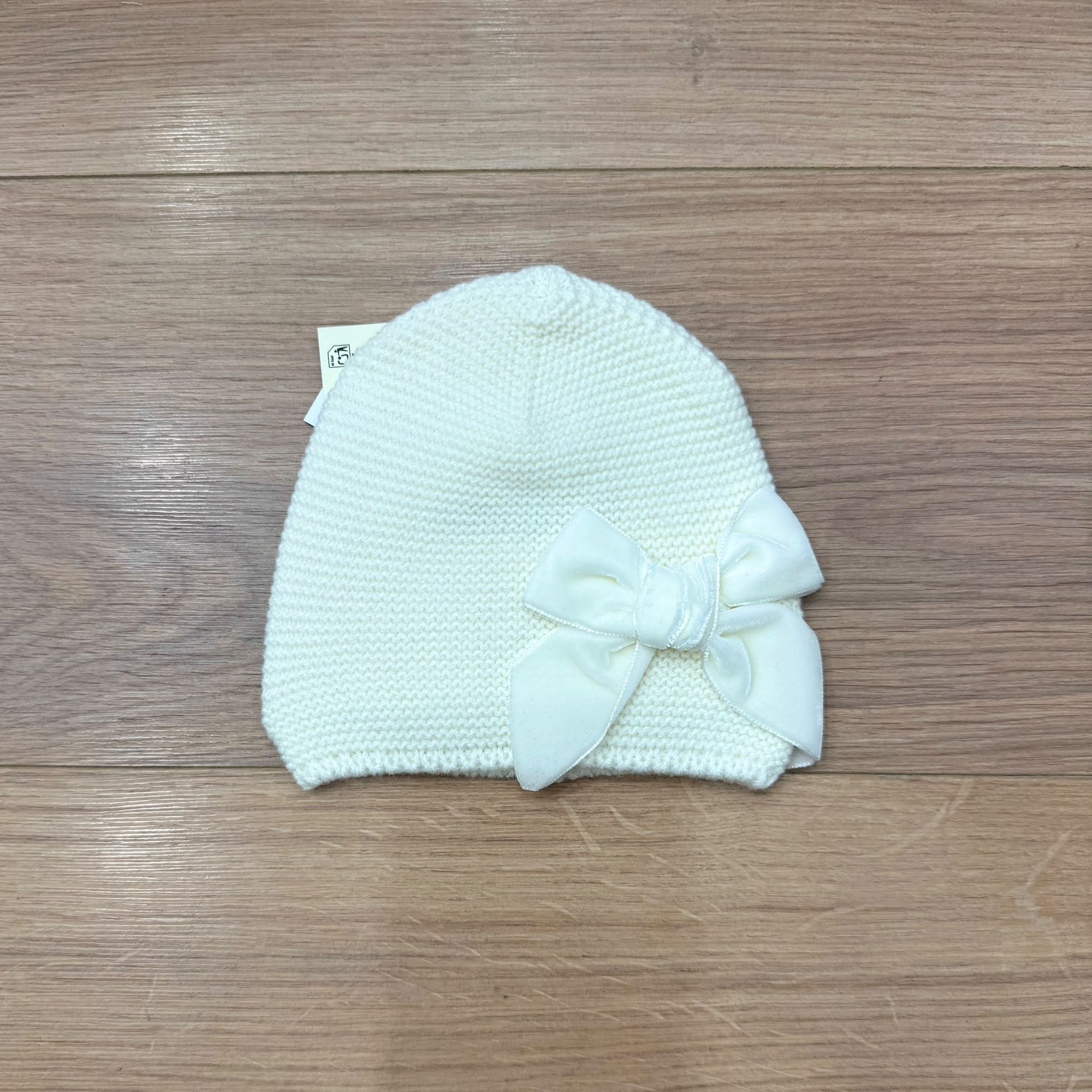 Condor cappellino con fiocco in velluto
