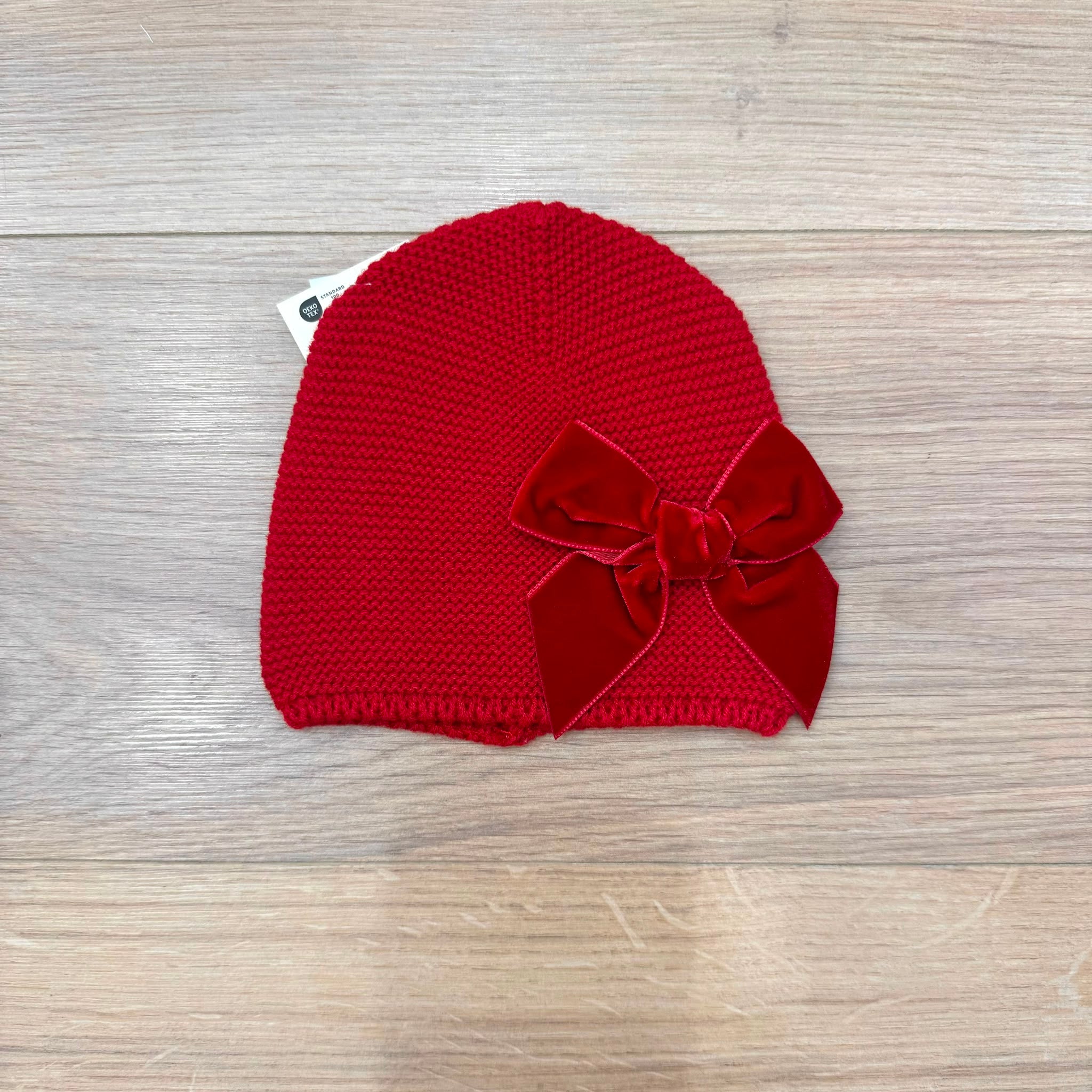 Condor cappellino con fiocco in velluto