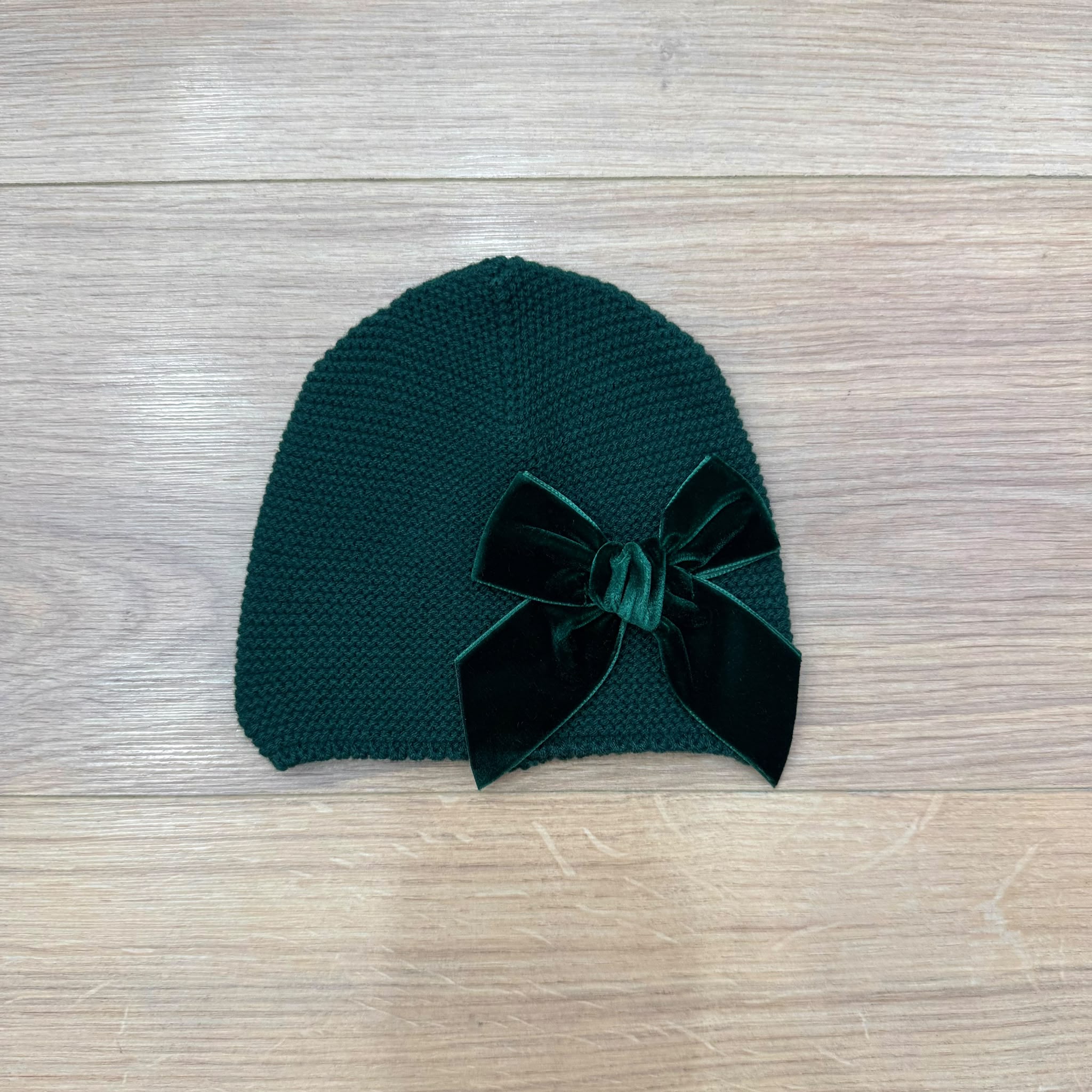 Condor cappellino con fiocco in velluto