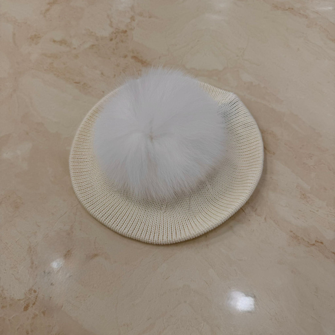 Basco con pom pon in volpe - Anima Kids