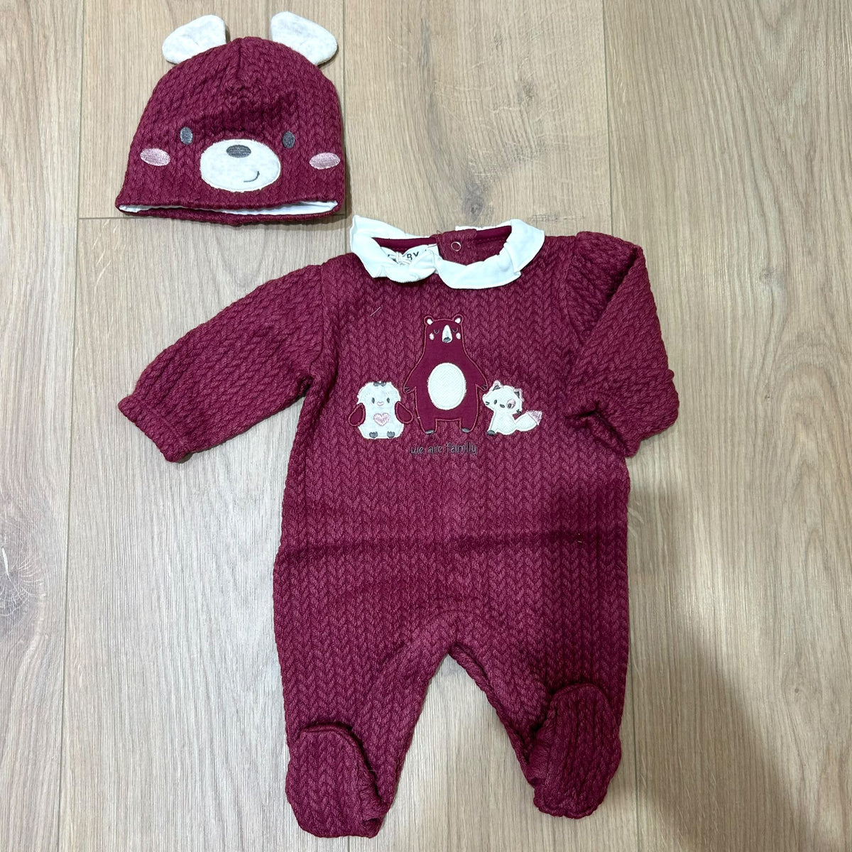 Melby tutina intreccio con cappellino