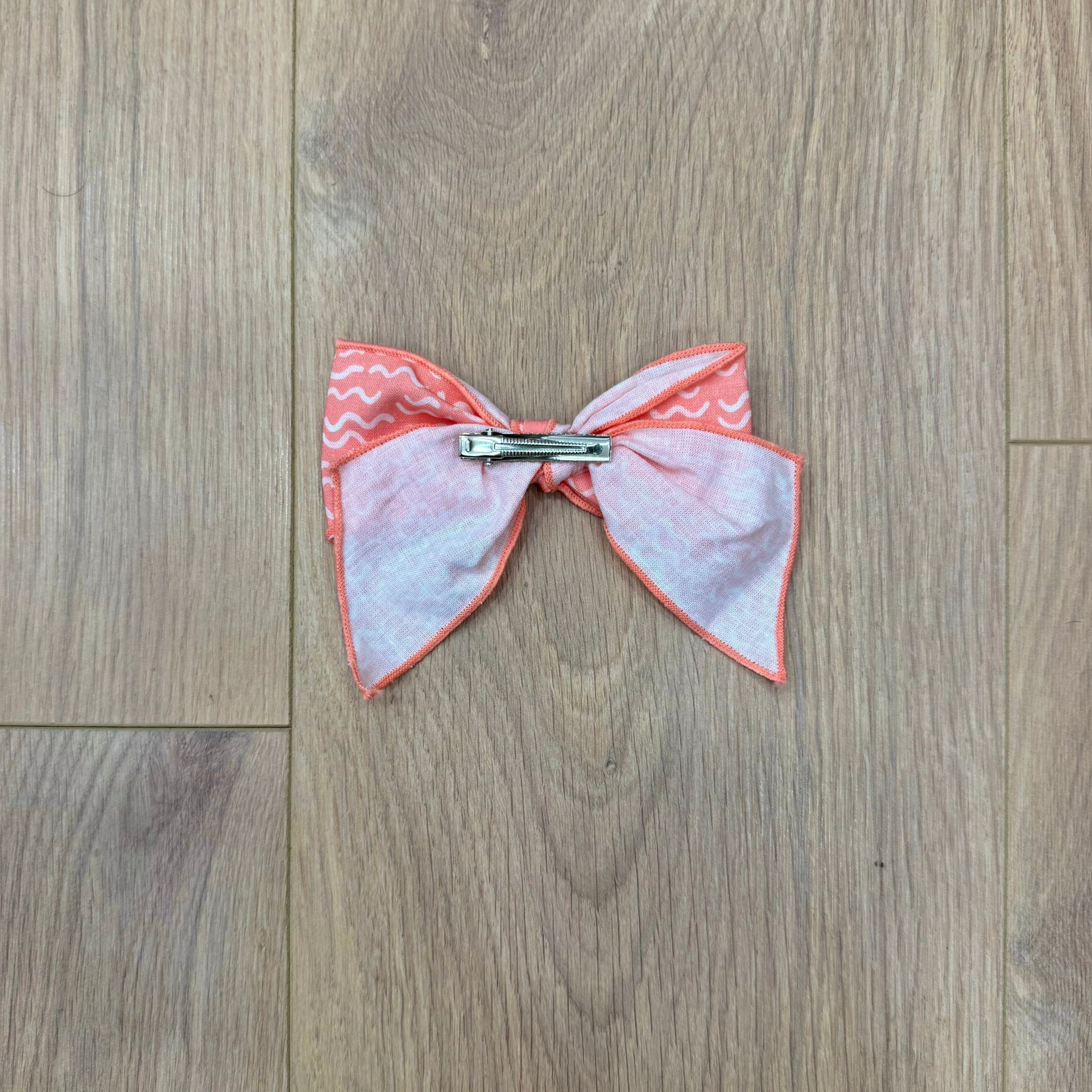 Calamaro Clip con fiocco - Anima Kids