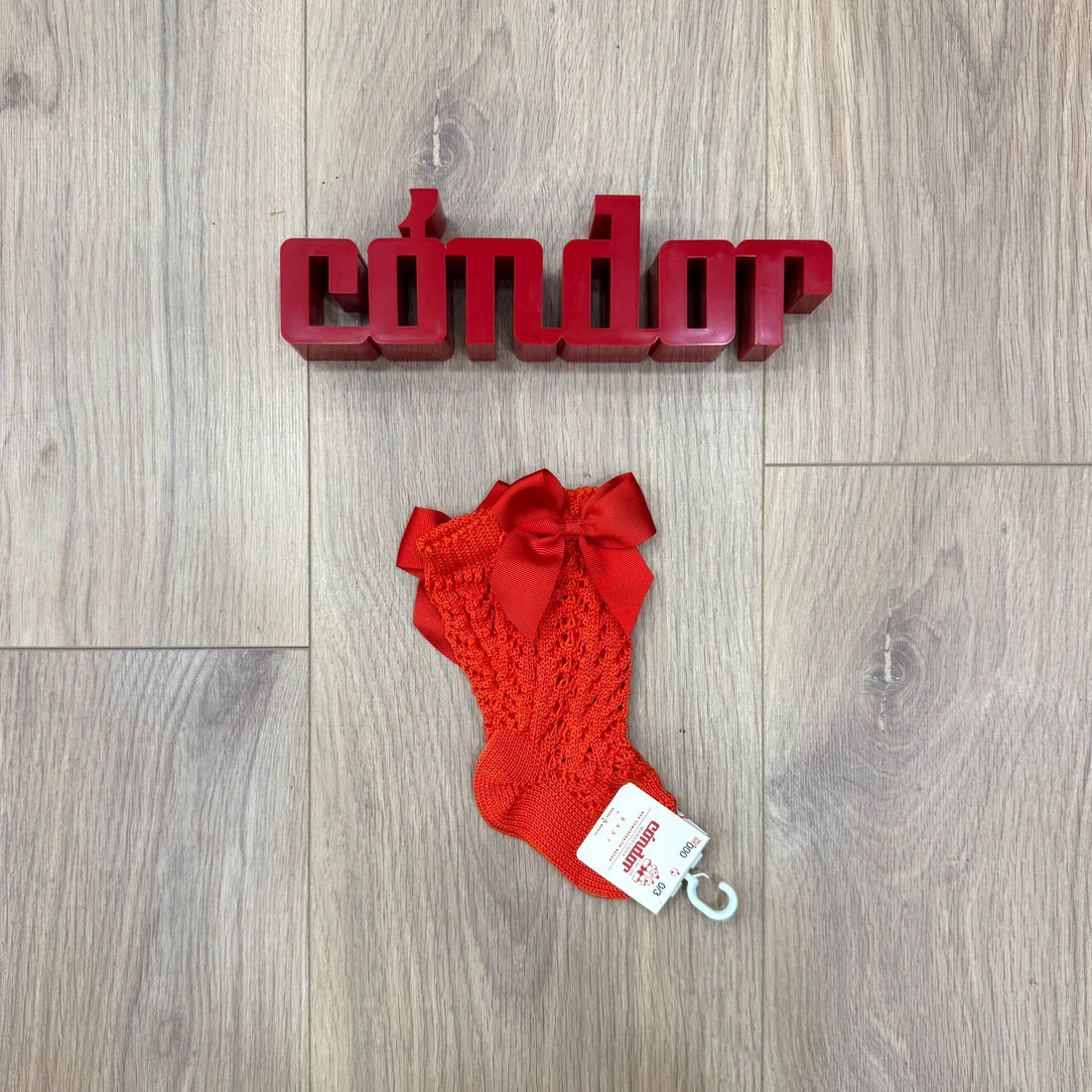 Condor calzino alto traforato con fiocco - Anima Kids