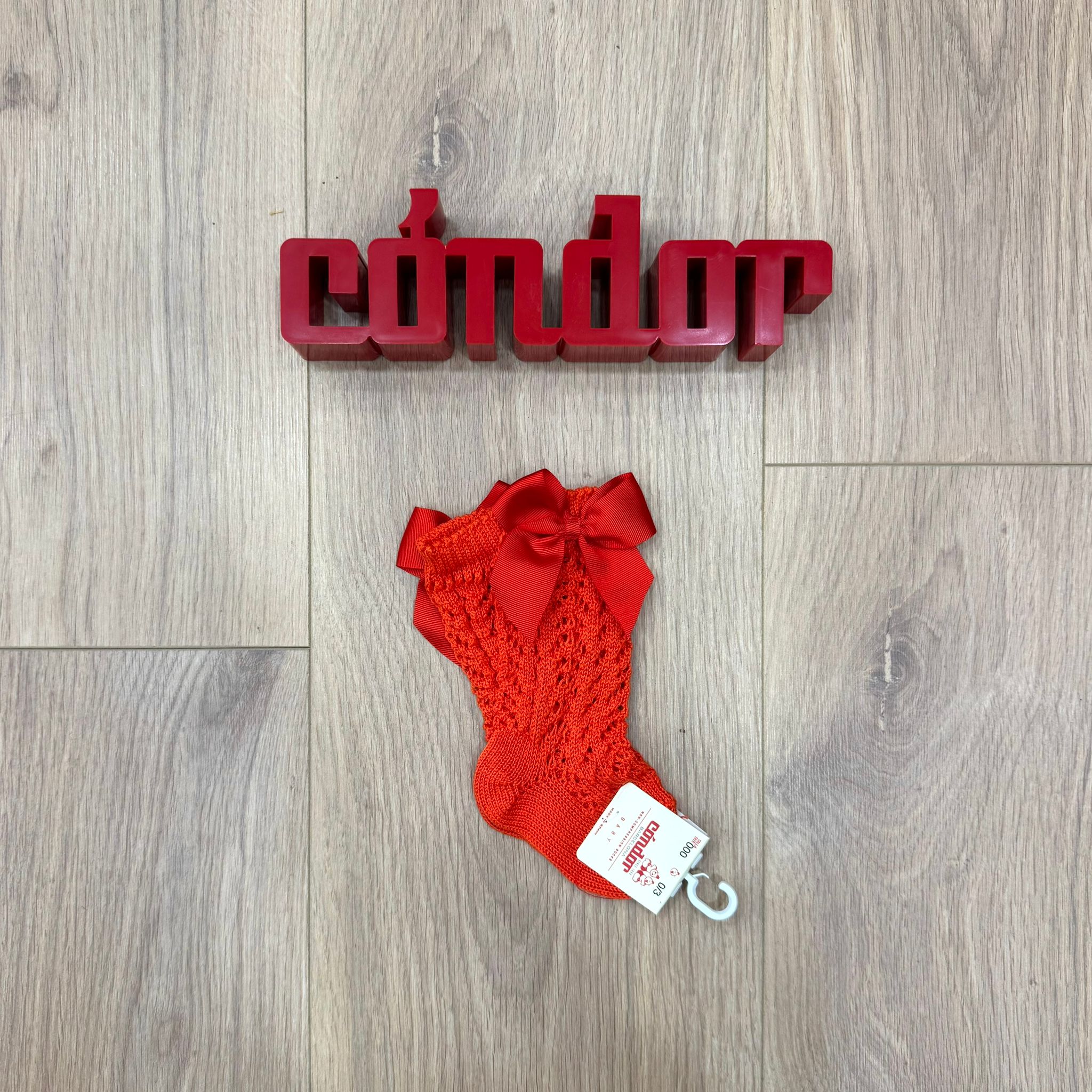 Condor calzino alto traforato con fiocco - Anima Kids