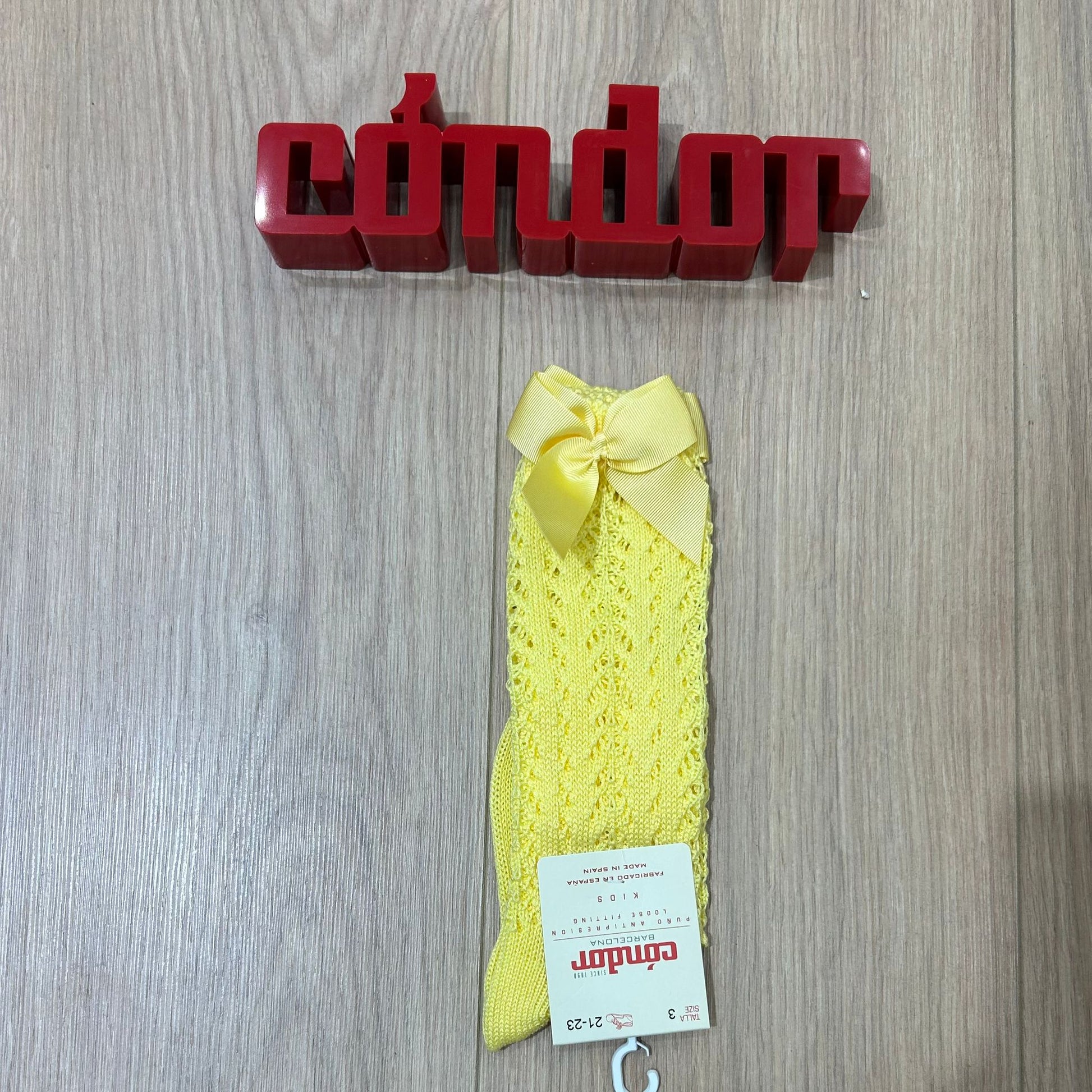 Condor calzino alto traforato con fiocco - Anima Kids