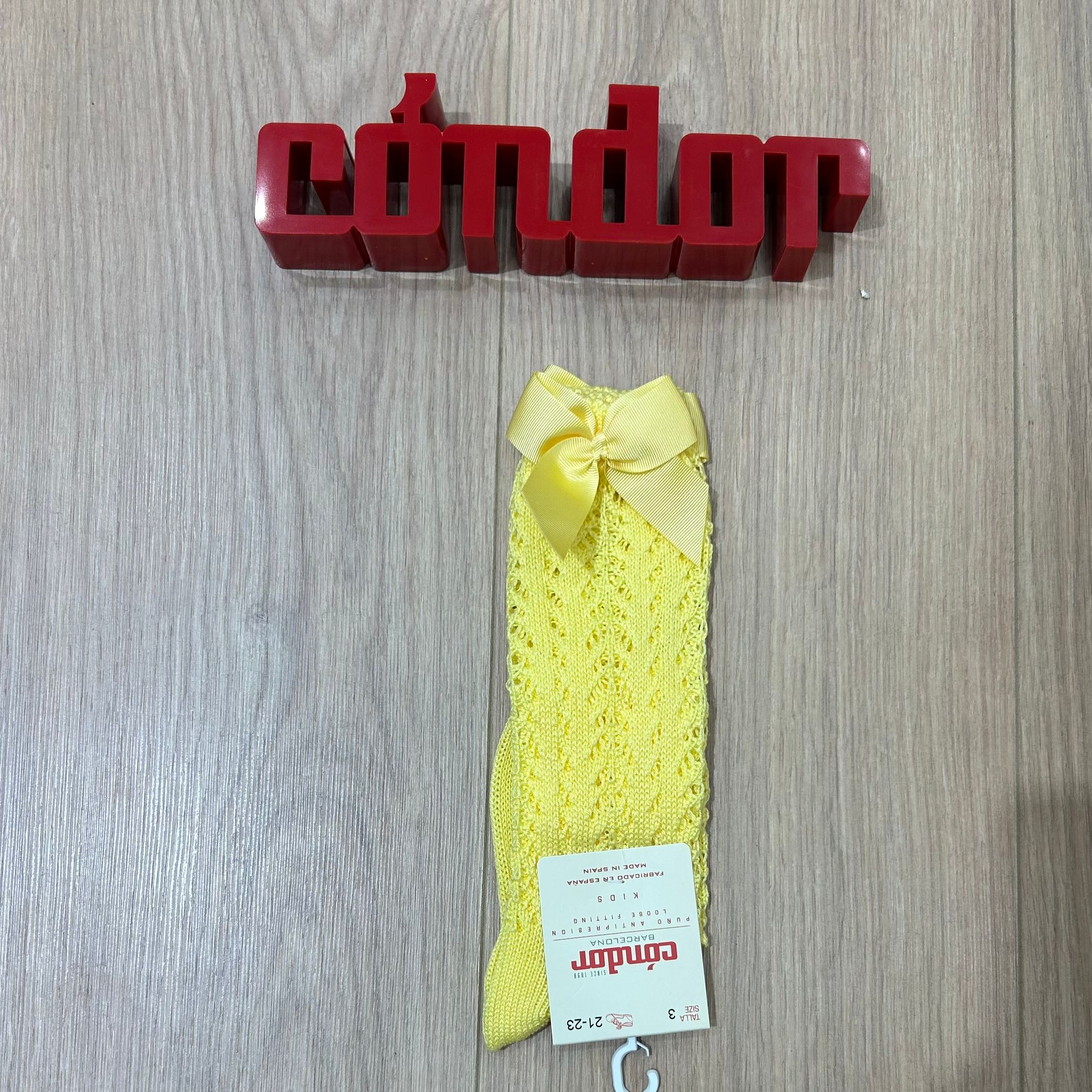 Condor calzino alto traforato con fiocco - Anima Kids