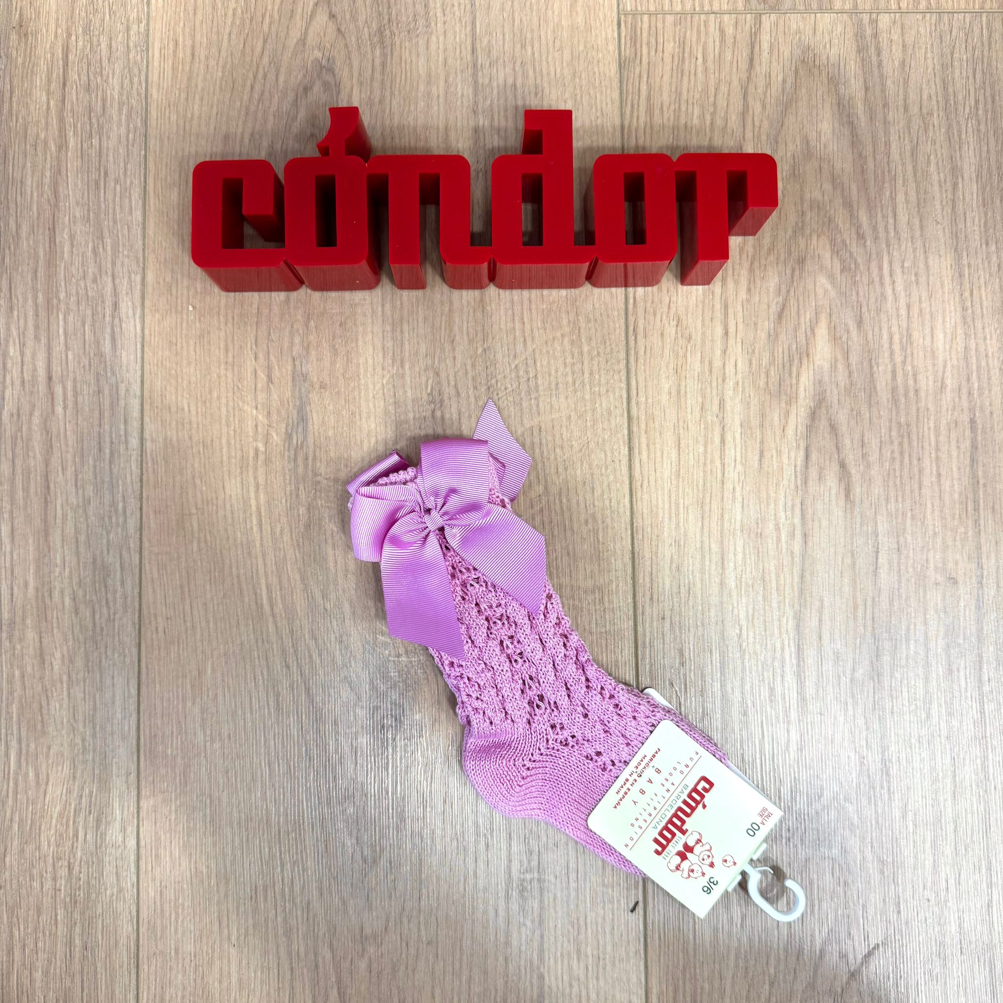 Condor calzino alto traforato con fiocco - Anima Kids
