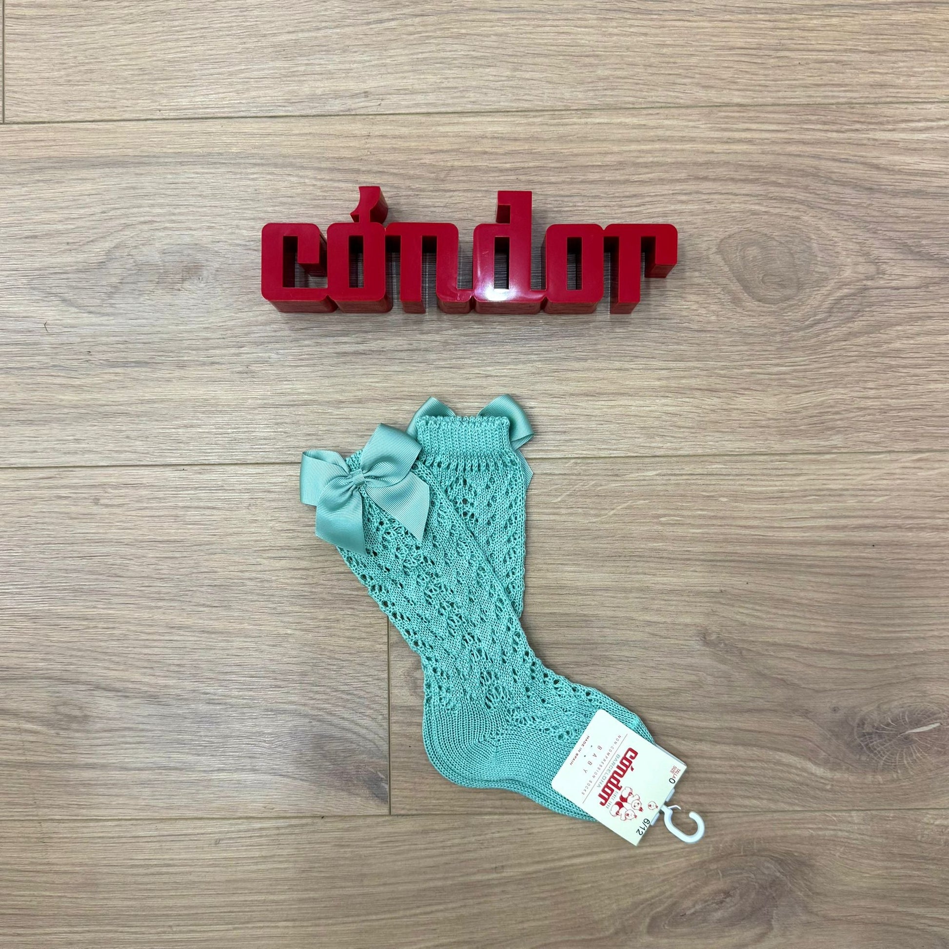 Condor calzino alto traforato con fiocco - Anima Kids