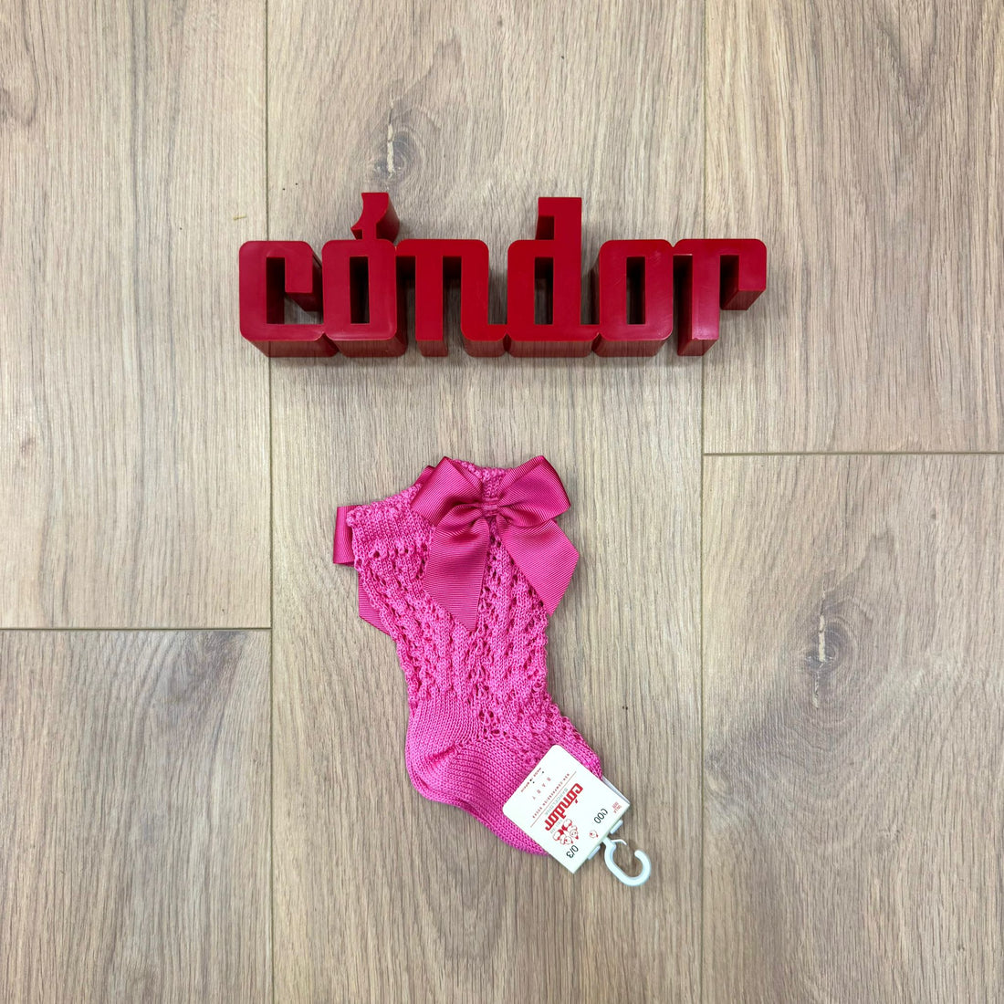 Condor calzino alto traforato con fiocco - Anima Kids