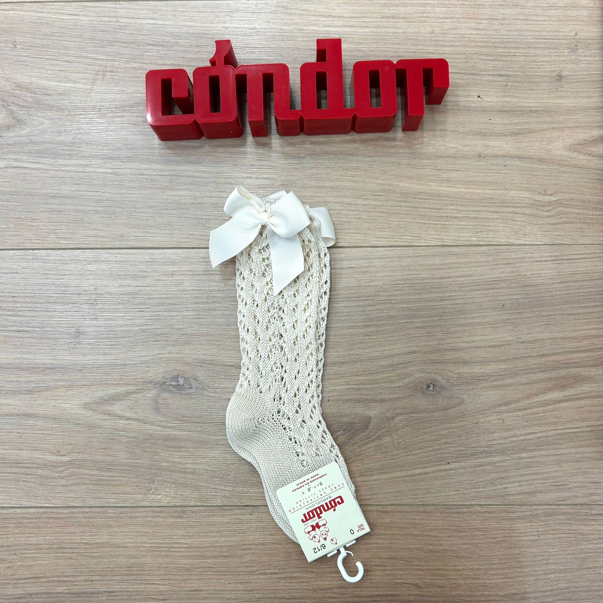 Condor calzino alto traforato con fiocco - Anima Kids