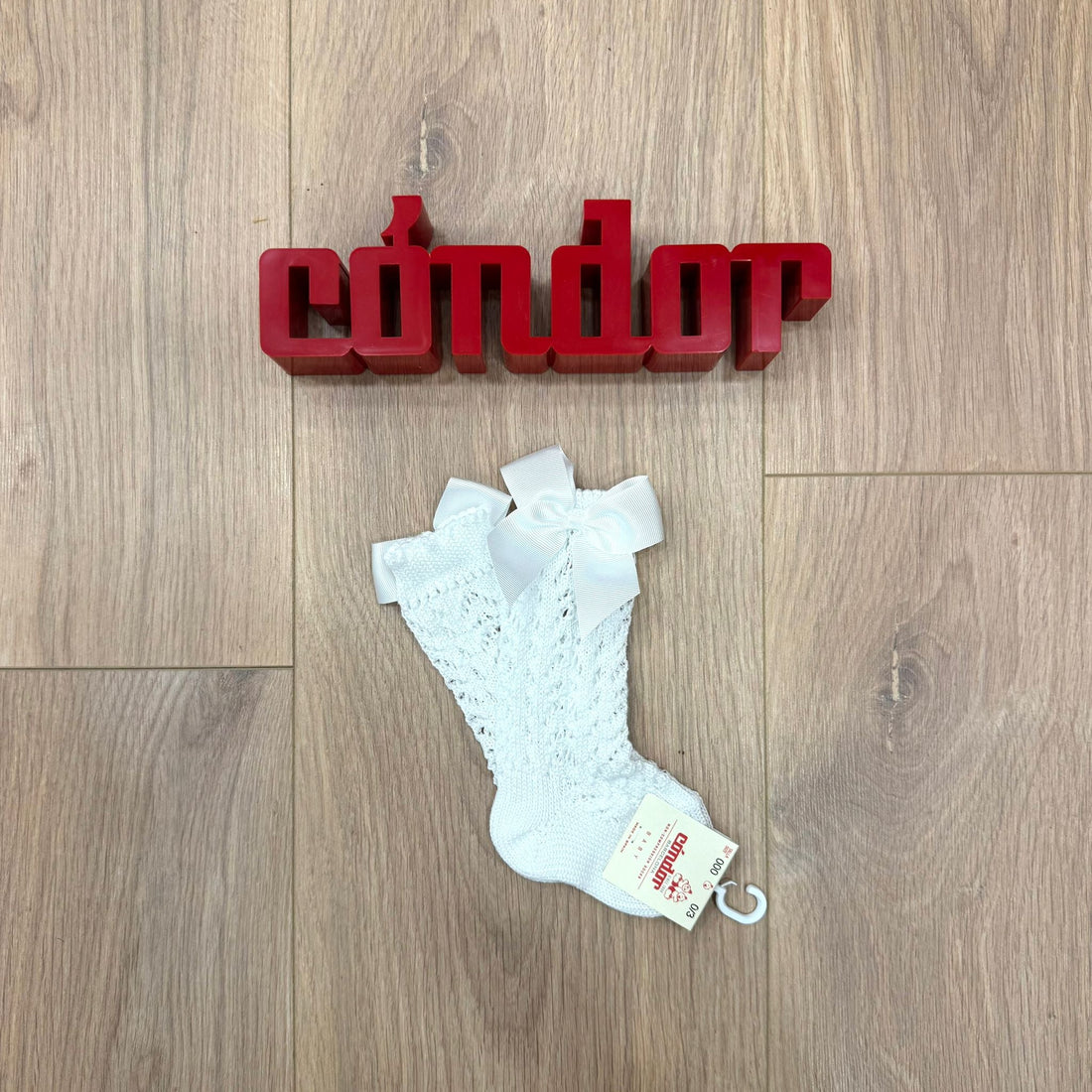 Condor calzino alto traforato con fiocco - Anima Kids