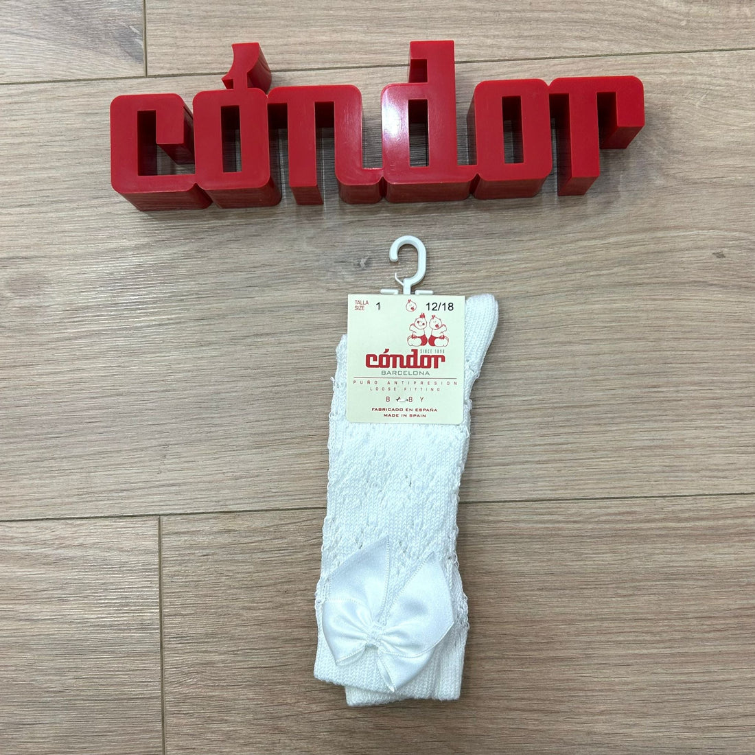 Condor calzino alto traforato con fiocco - Anima Kids