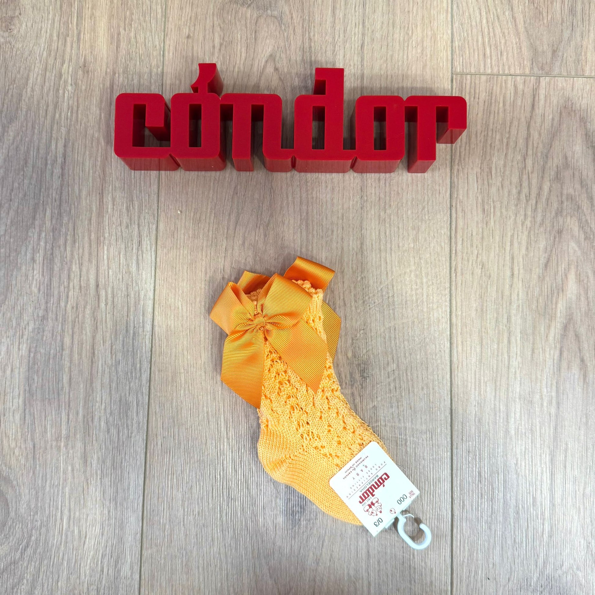 Condor calzino alto traforato con fiocco - Anima Kids