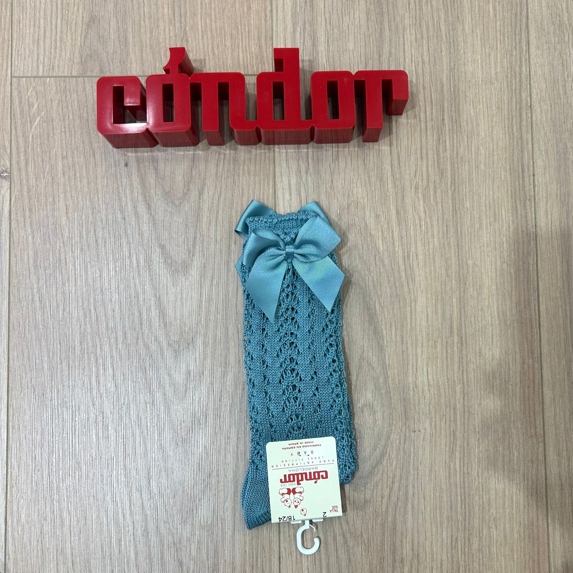 Condor calzino alto traforato con fiocco - Anima Kids
