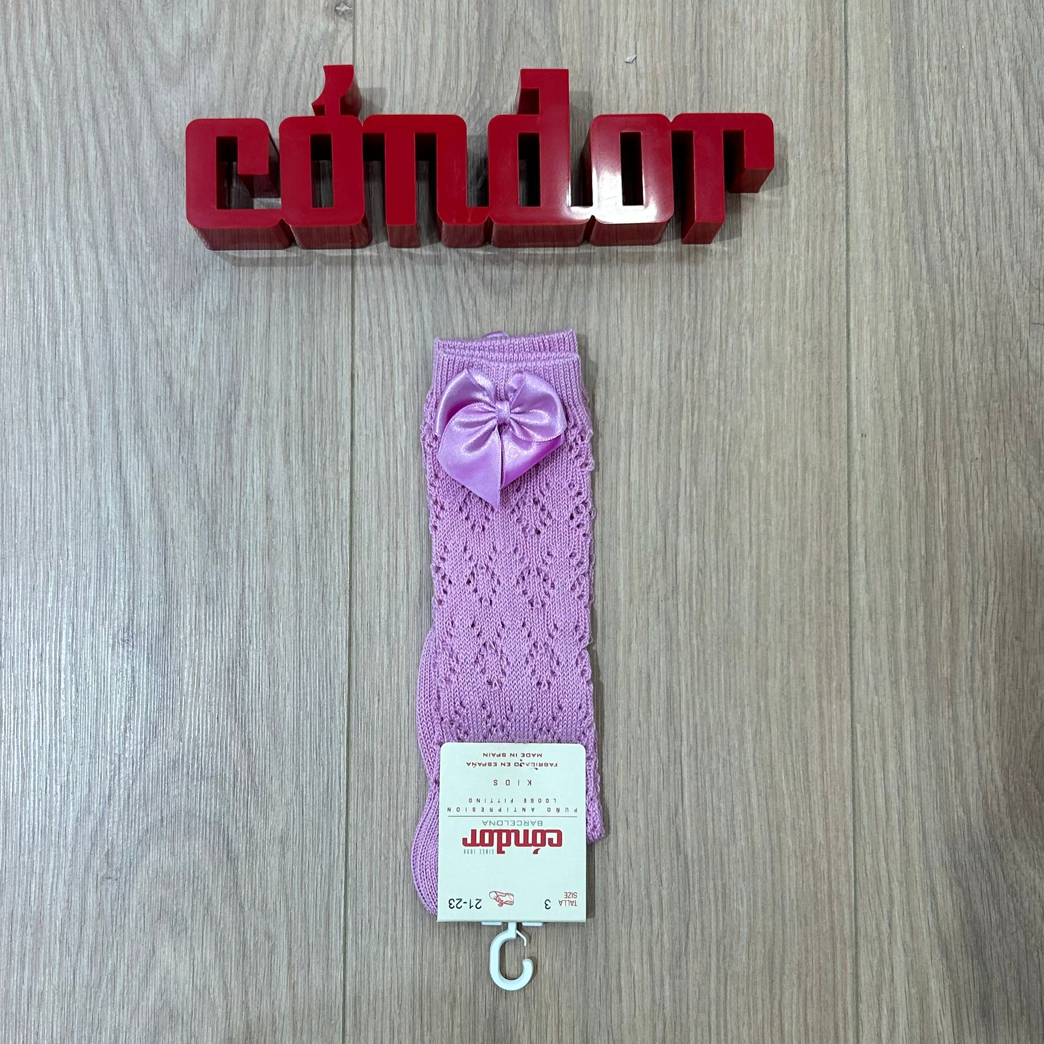 Condor calzino alto traforato con fiocco - Anima Kids