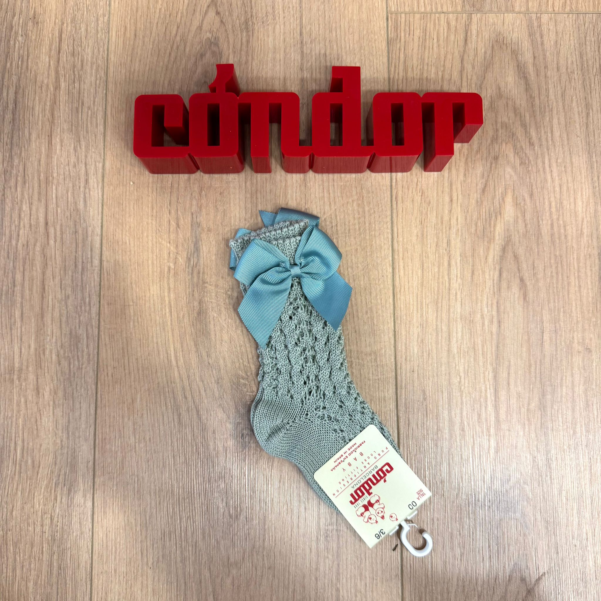 Condor calzino alto traforato con fiocco - Anima Kids