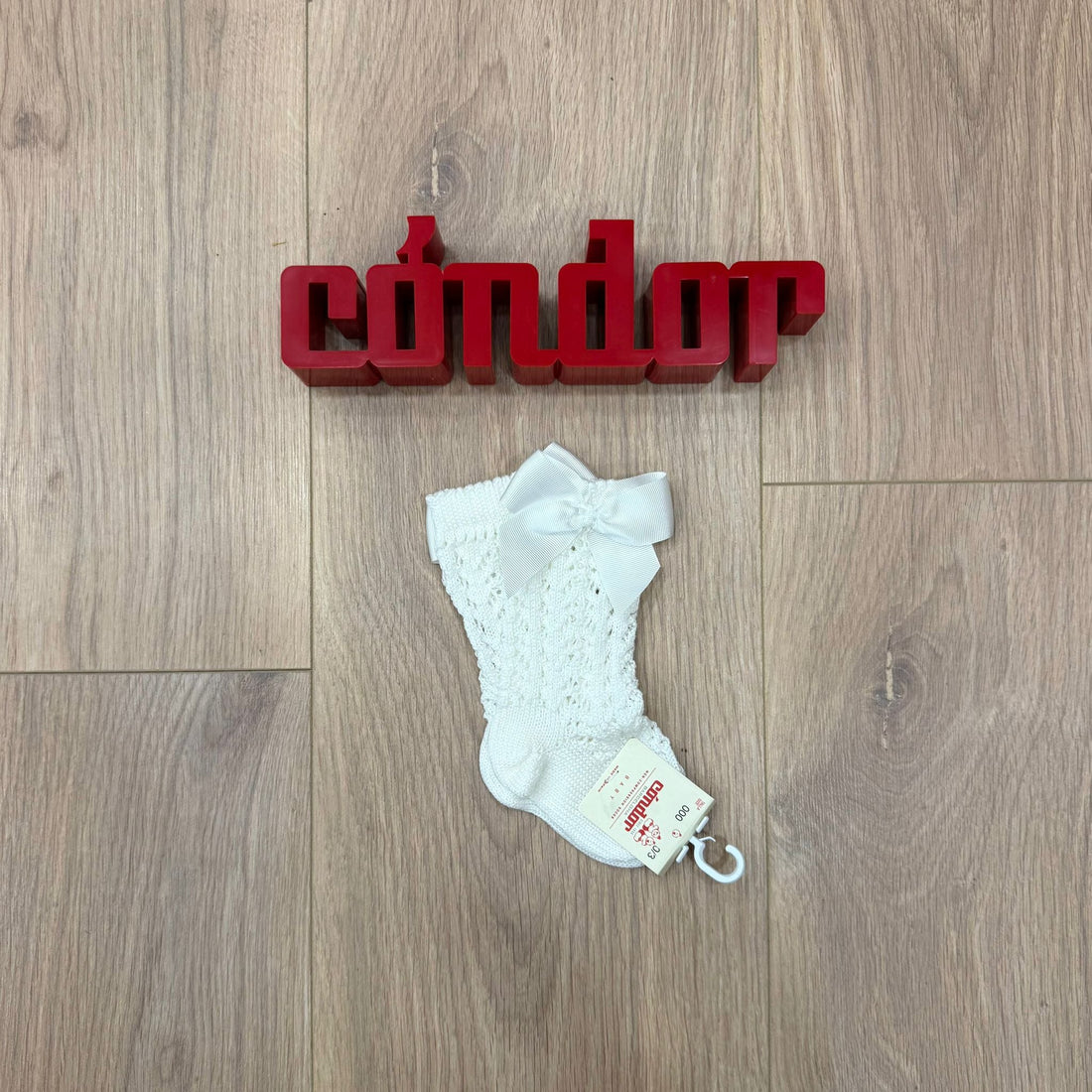 Condor calzino alto traforato con fiocco - Anima Kids