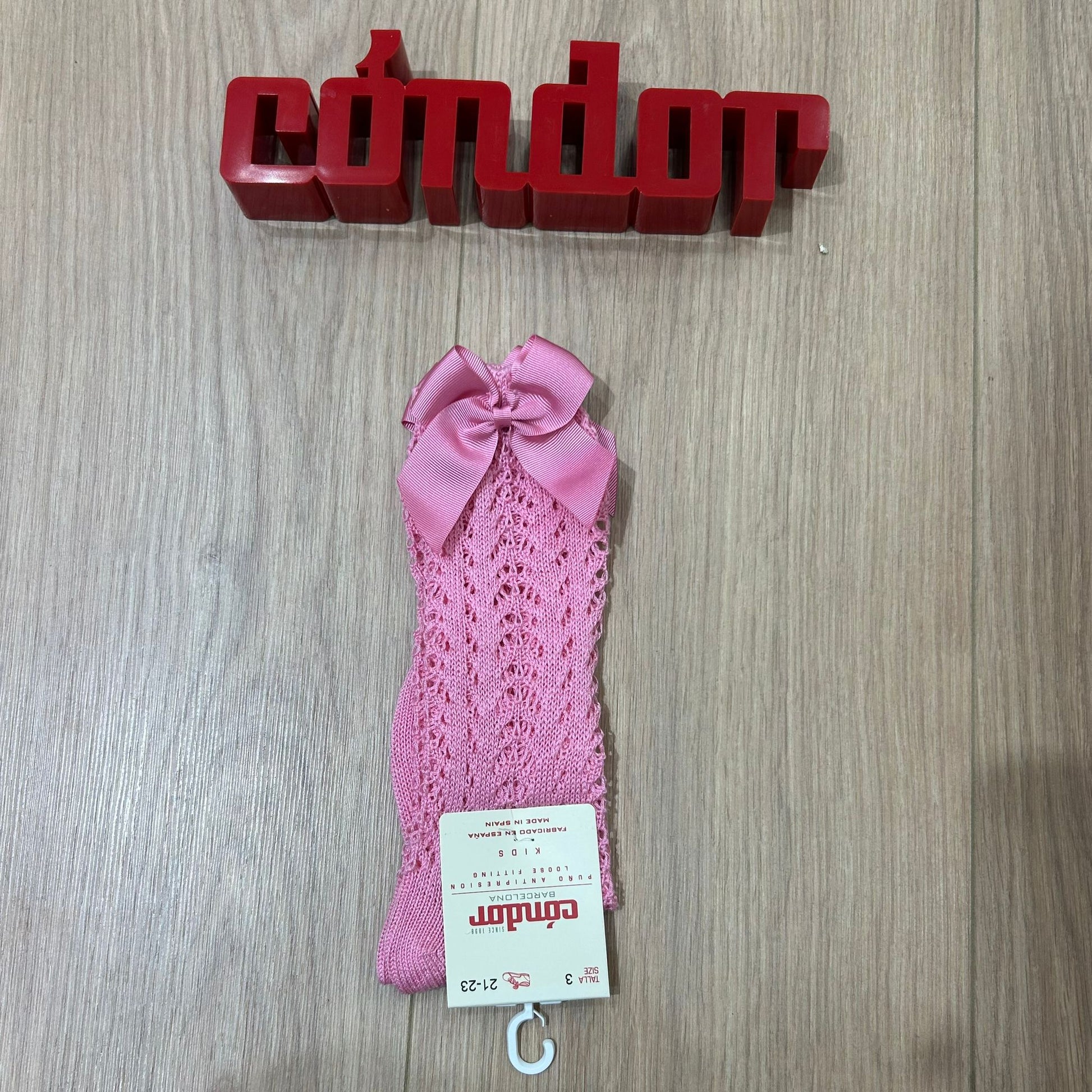 Condor calzino alto traforato con fiocco - Anima Kids