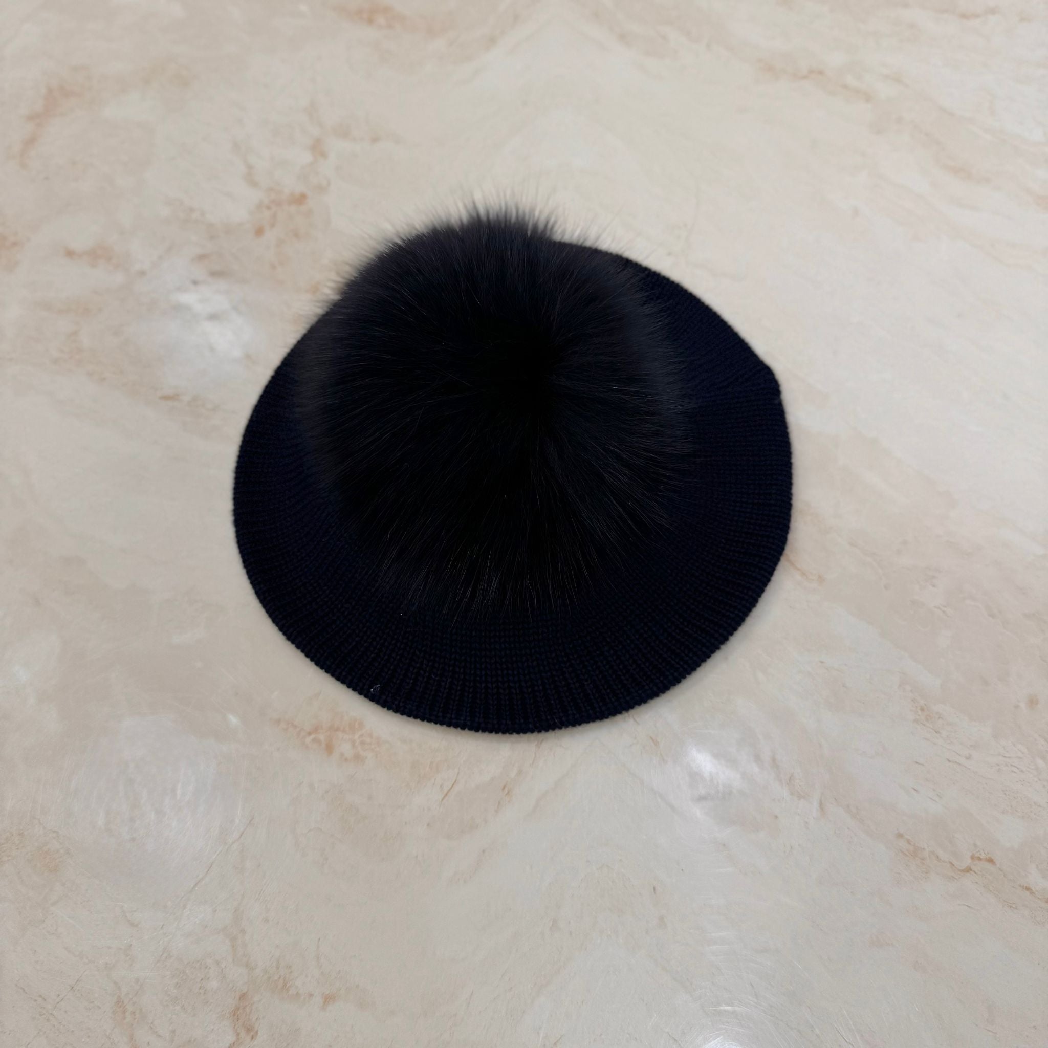 Basco con pompon in volpe